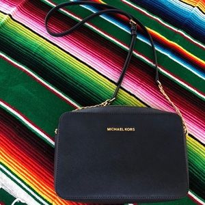 Blue Michael Kors crossbody purse
